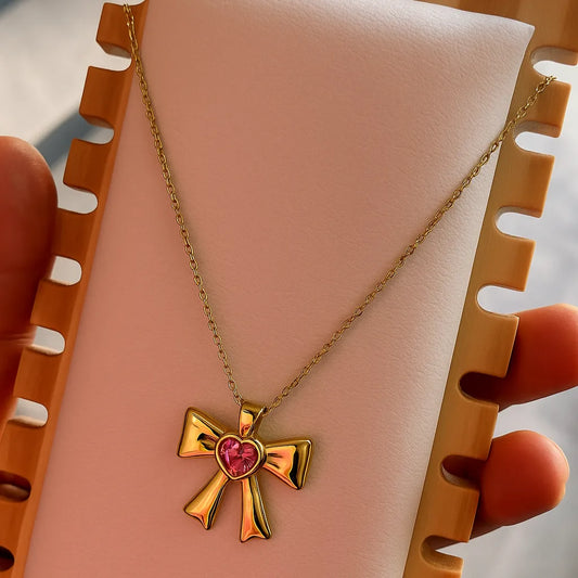 Elegant Bow Heart Necklace – Gold & Pink Stone