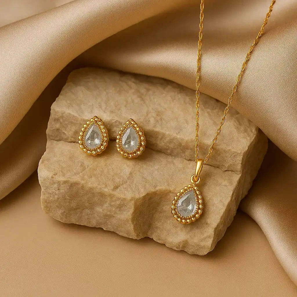 Anti-tarnish gold teardrop pendant set with earrings in jewelry box