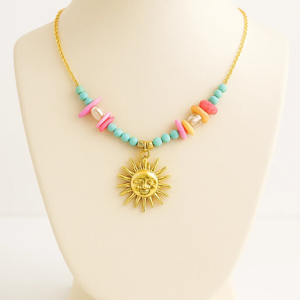 Necklace with colorful beads and a sun pendant on a mannequin bust.