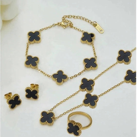 Anti-Tarnish Black Clover Gold Jewelry Set with matching necklace, bracelet, earrings, and ring