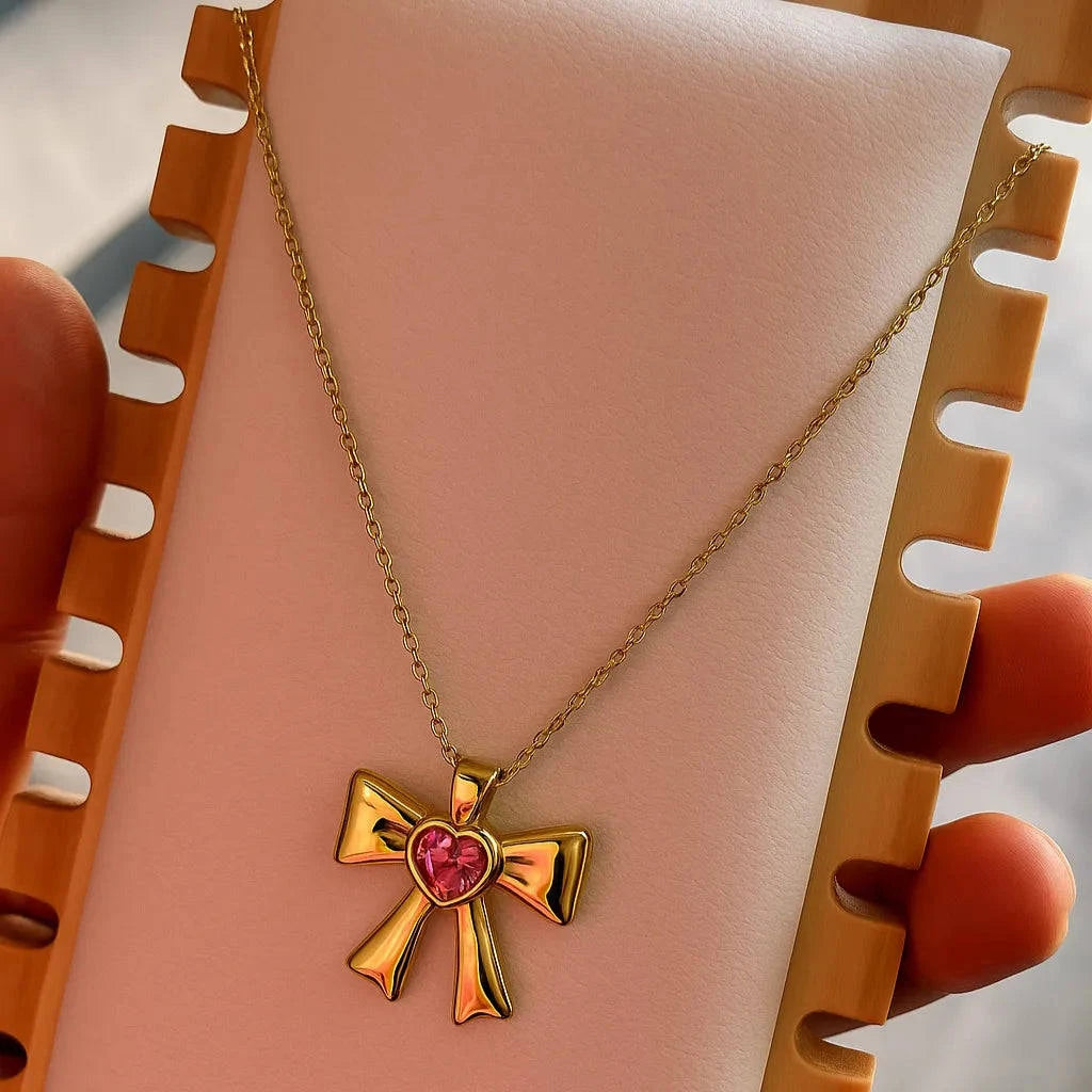 Elegant Bow Heart Necklace – Gold & Pink Stone Gems and Glitter