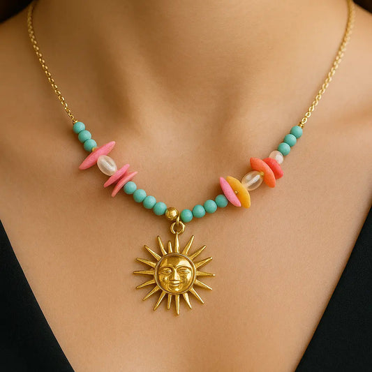 Necklace with sun pendant and colorful beads on a model against a black background