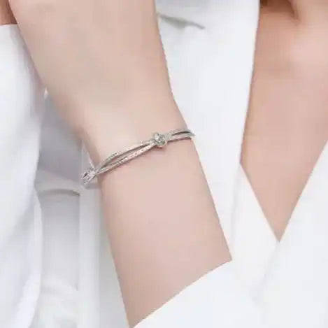Rose Gold Knot Bangle with Diamond Accents Gems and Glitter